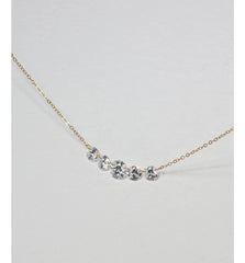 Lumière Rivière Necklace in gold with five graduated round zirconia stones