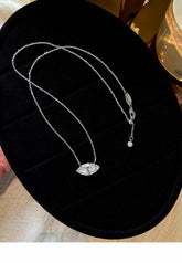 Marquise Necklace in silver displayed on a black jewelry tray