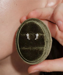 Silver Étoile Filante earrings displayed in a velvet jewellery box